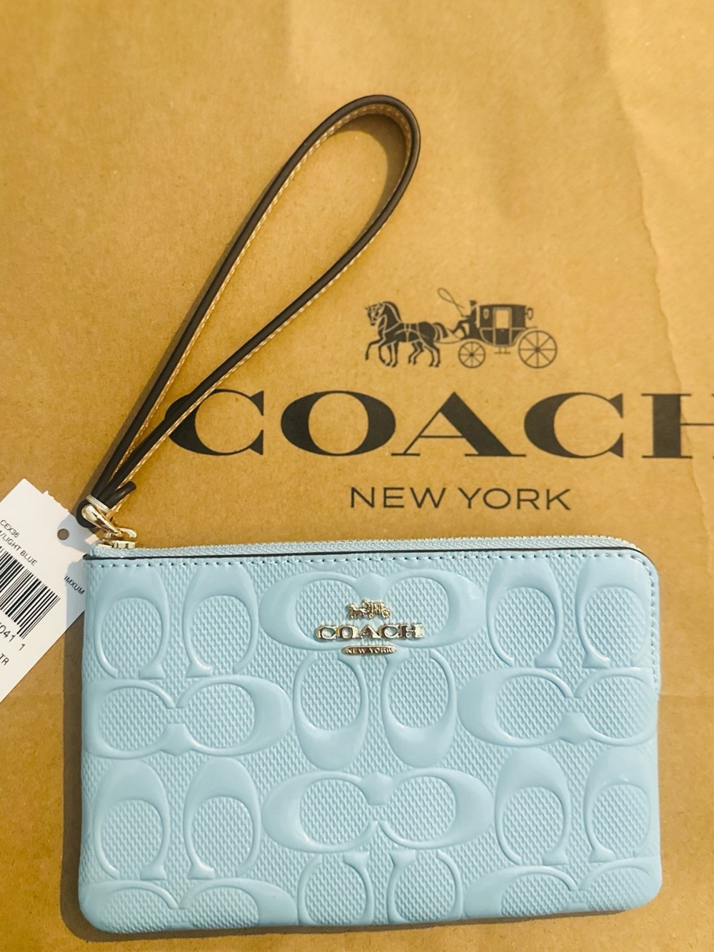 Coach Light Blue Embossed Signature Wristlet